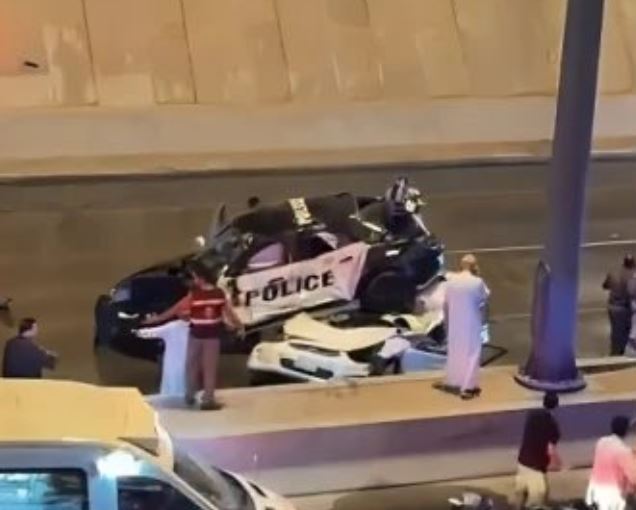Saudi police vehicle plunges from bridge during chase, killing motorist